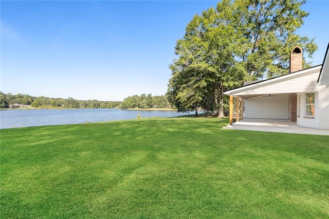 view of yard with a water view