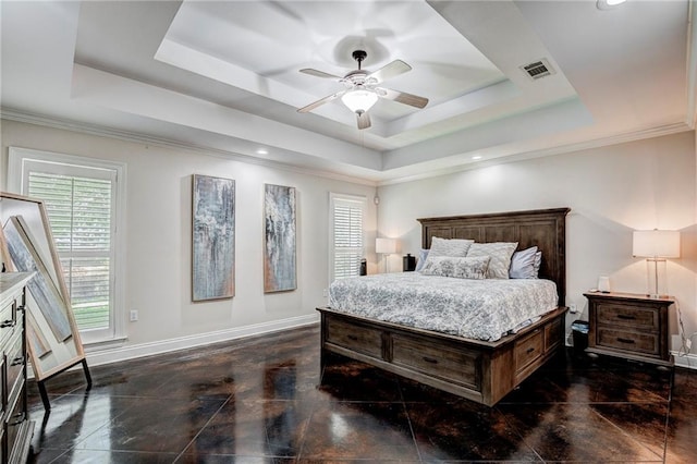 bedroom with ceiling fan, a raised ceiling, and ornamental molding