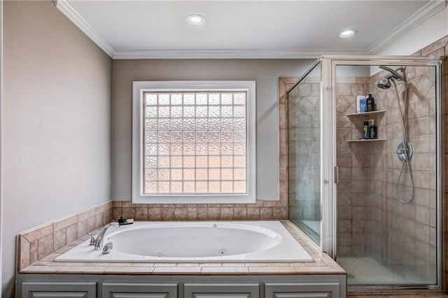 bathroom with separate shower and tub and ornamental molding