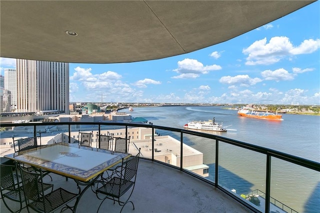 balcony featuring a water view