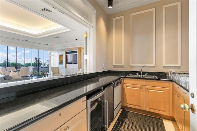 kitchen with sink, beverage cooler, dishwasher, crown molding, and tile patterned flooring