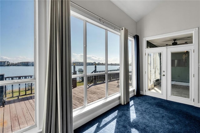 doorway featuring vaulted ceiling, a water view, and french doors