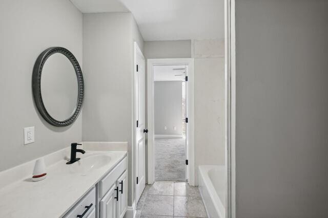 bathroom featuring vanity and tile patterned floors