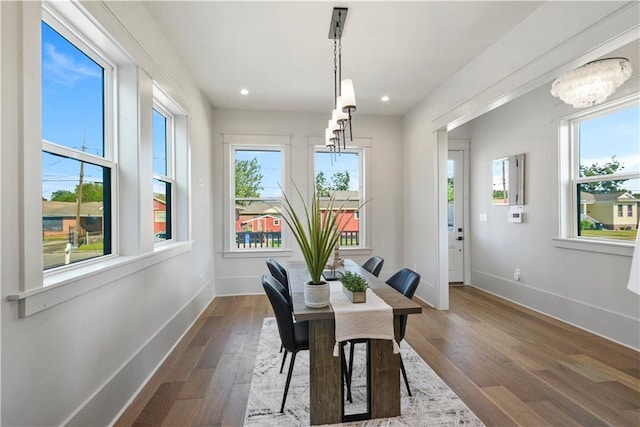 dining room with dark wood-type flooring