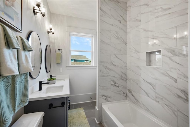 bathroom with tile patterned floors and vanity