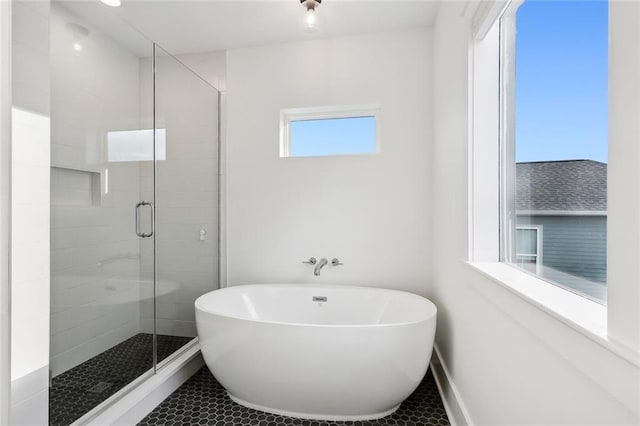 bathroom with plus walk in shower and tile patterned floors