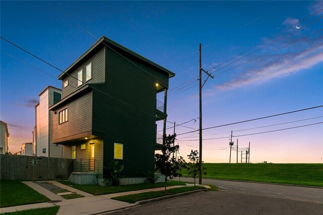 view of front of house with a yard