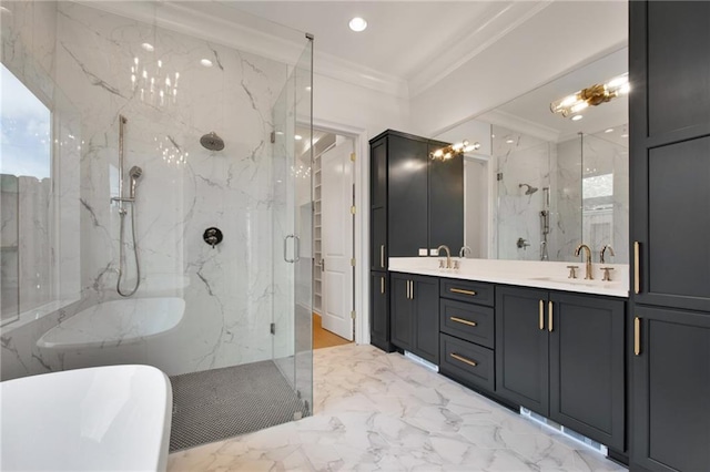 bathroom featuring vanity, crown molding, and separate shower and tub