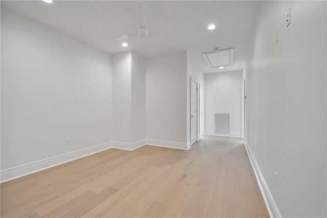 empty room with light hardwood / wood-style floors