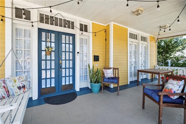 2724 Clover St, New Orleans, LA 70122 - property entrance featuring french doors and covered porch
