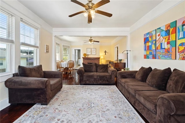 2724 Clover St, New Orleans, LA 70122 - living area featuring dark wood-style flooring and a ceiling fan
