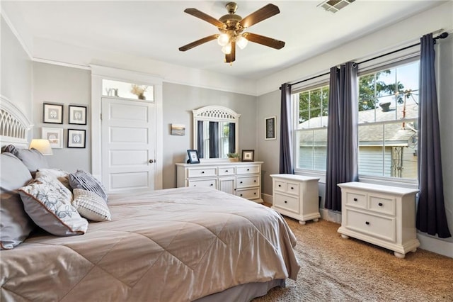 2724 Clover St, New Orleans, LA 70122 - bedroom with light colored carpet and ceiling fan