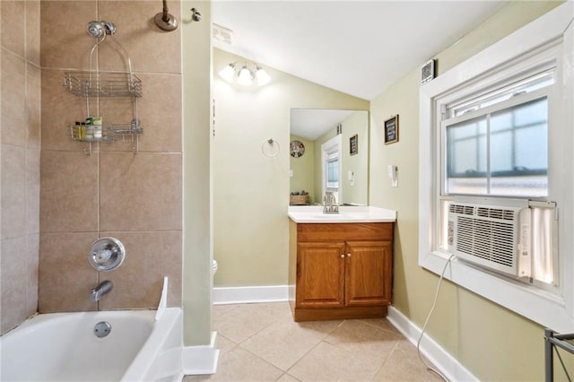 full bathroom with cooling unit, vanity, lofted ceiling, tile patterned floors, and toilet