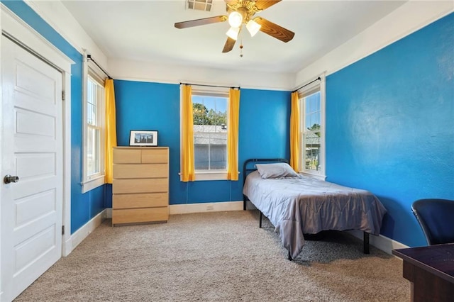 2724 Clover St, New Orleans, LA 70122 - bedroom with carpet, a ceiling fan, and baseboards