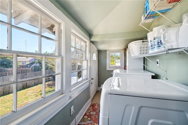 2724 Clover St, New Orleans, LA 70122 - washroom with washing machine and clothes dryer, tile patterned flooring, and baseboards