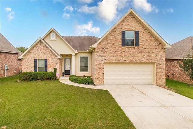 front facade featuring a front yard and a garage