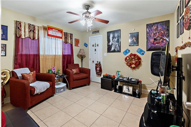 tiled living room featuring ceiling fan