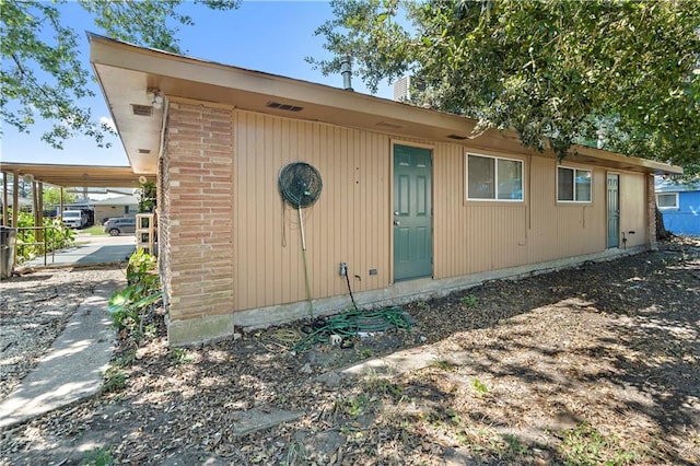 view of outdoor structure with a carport