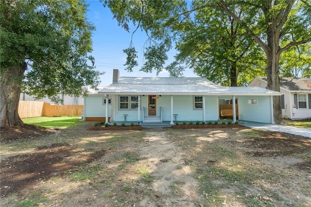 ranch-style house featuring a porch