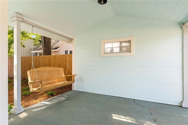 exterior space featuring lofted ceiling