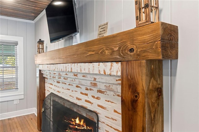 room details featuring hardwood / wood-style flooring and crown molding