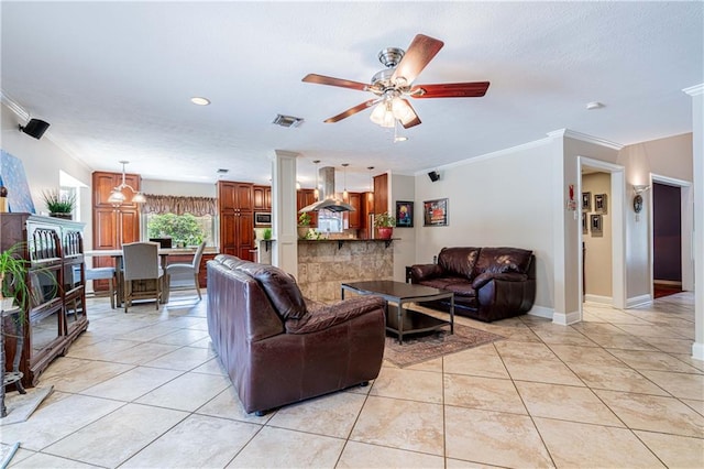 tiled living room featuring ceiling fan and ornamental molding