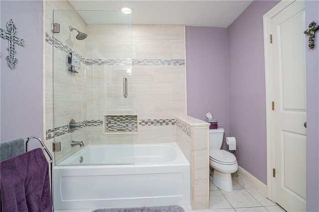 bathroom featuring independent shower and bath, tile patterned flooring, and toilet