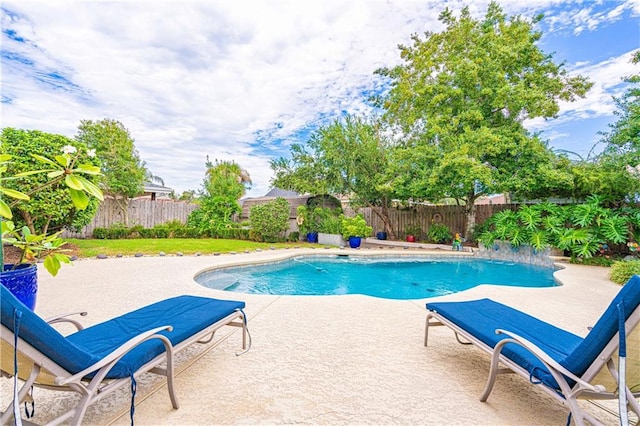 view of pool featuring a patio