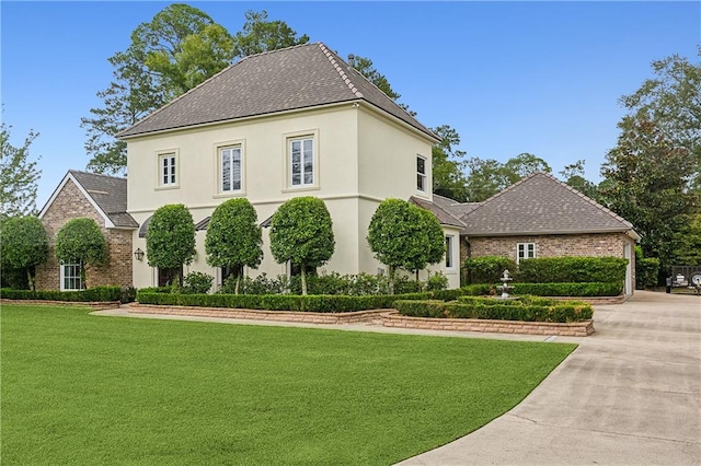 view of home's exterior featuring a yard