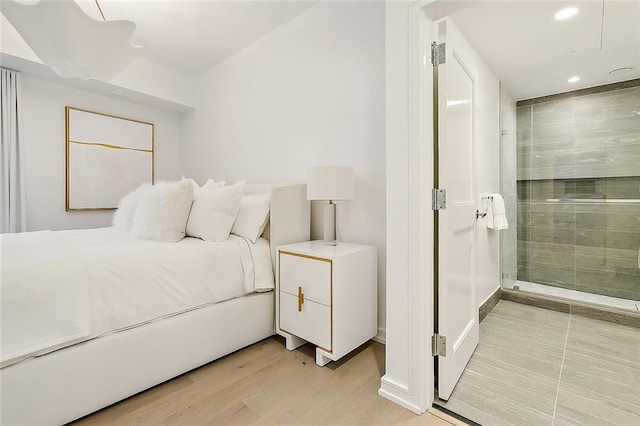 bedroom with light wood-type flooring