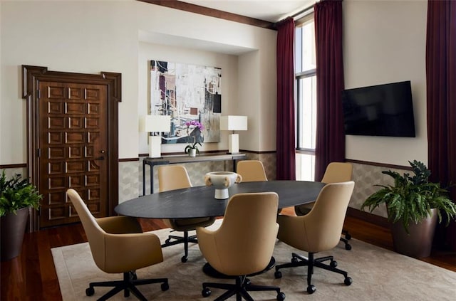 dining room with hardwood / wood-style flooring