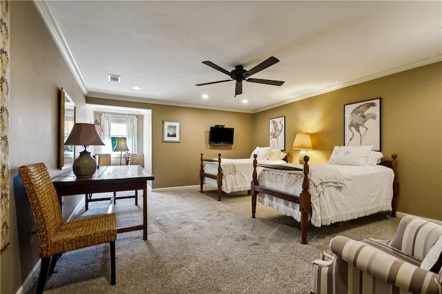 bedroom featuring ceiling fan, crown molding, and carpet flooring