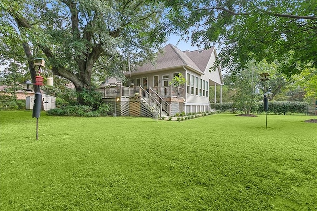 view of yard with a wooden deck