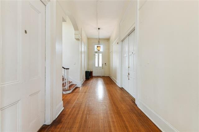 corridor with dark wood-type flooring