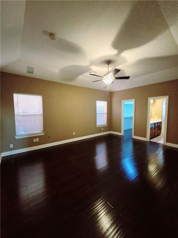 spare room featuring ceiling fan and wood-type flooring