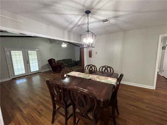 empty room featuring a textured ceiling, dark wood-type flooring, crown molding, and ceiling fan