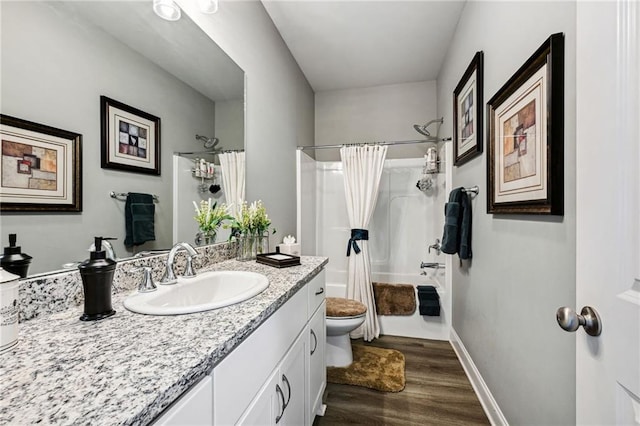 full bathroom with toilet, shower / bath combo, vanity, and hardwood / wood-style flooring