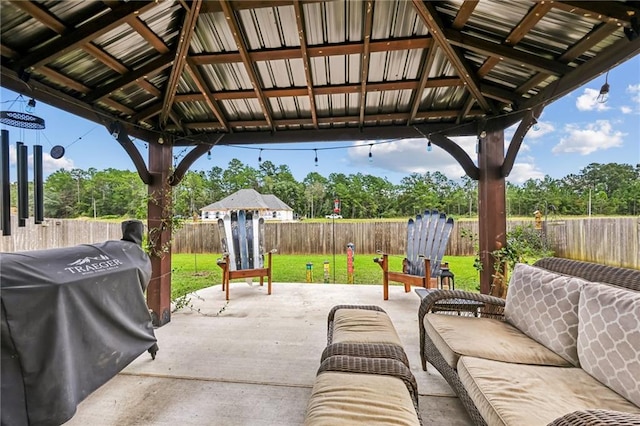 view of patio / terrace with a gazebo, outdoor lounge area, and a grill