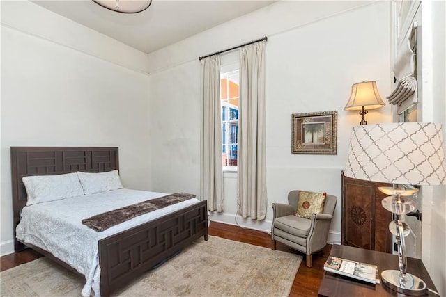 bedroom featuring hardwood / wood-style flooring