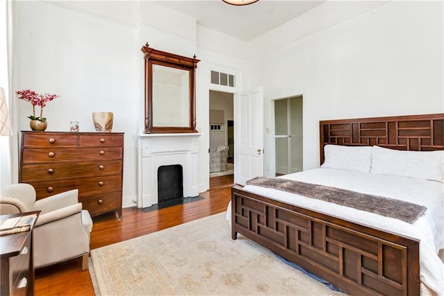 bedroom featuring hardwood / wood-style floors