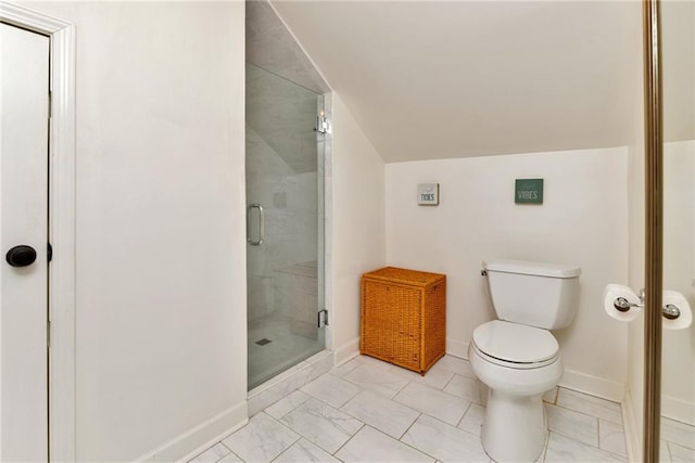 bathroom with toilet and a shower with shower door