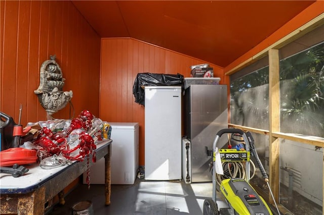 washroom with wooden walls