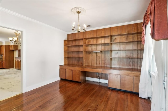 unfurnished office with an inviting chandelier, dark wood-type flooring, and crown molding