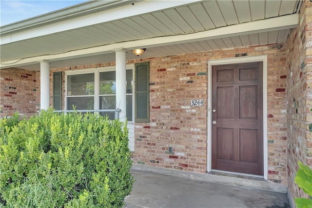 property entrance with a porch