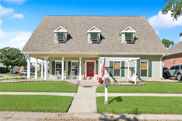 view of front of property with a front lawn and a porch