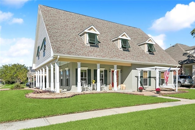 view of front of home featuring a front lawn and a porch