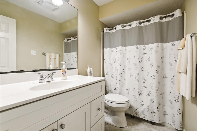 bathroom featuring tile patterned floors, vanity, toilet, and a shower with curtain