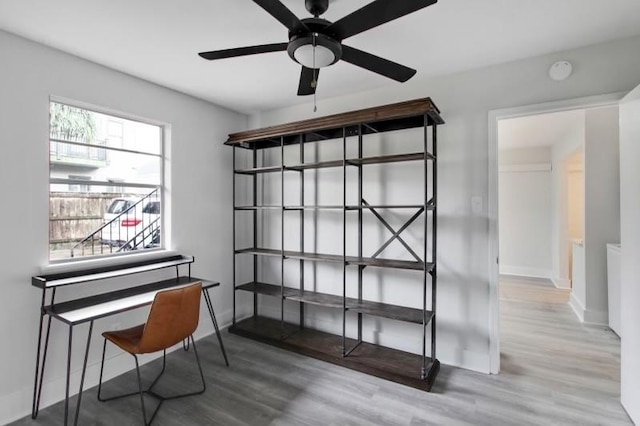 interior space featuring ceiling fan and hardwood / wood-style flooring