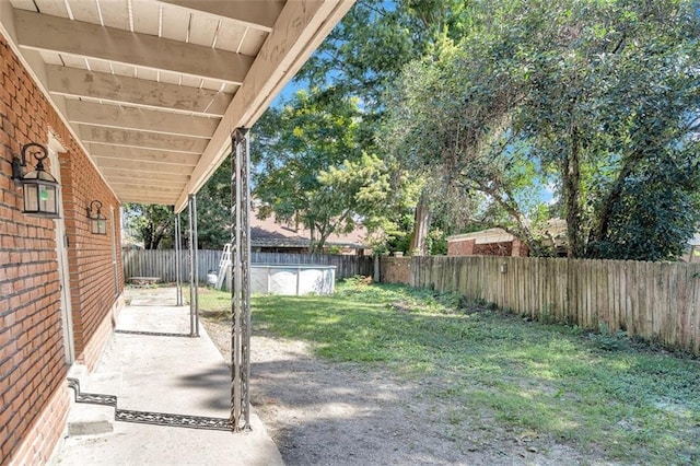 view of yard featuring a patio area