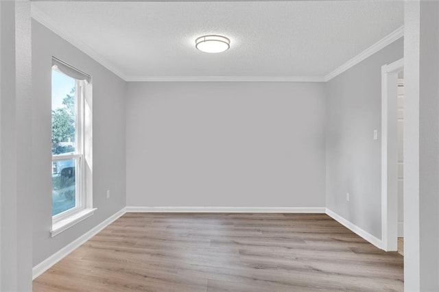 3730 Huntlee Dr, New Orleans, LA 70131 - spare room with wood finished floors, crown molding, a textured ceiling, and baseboards